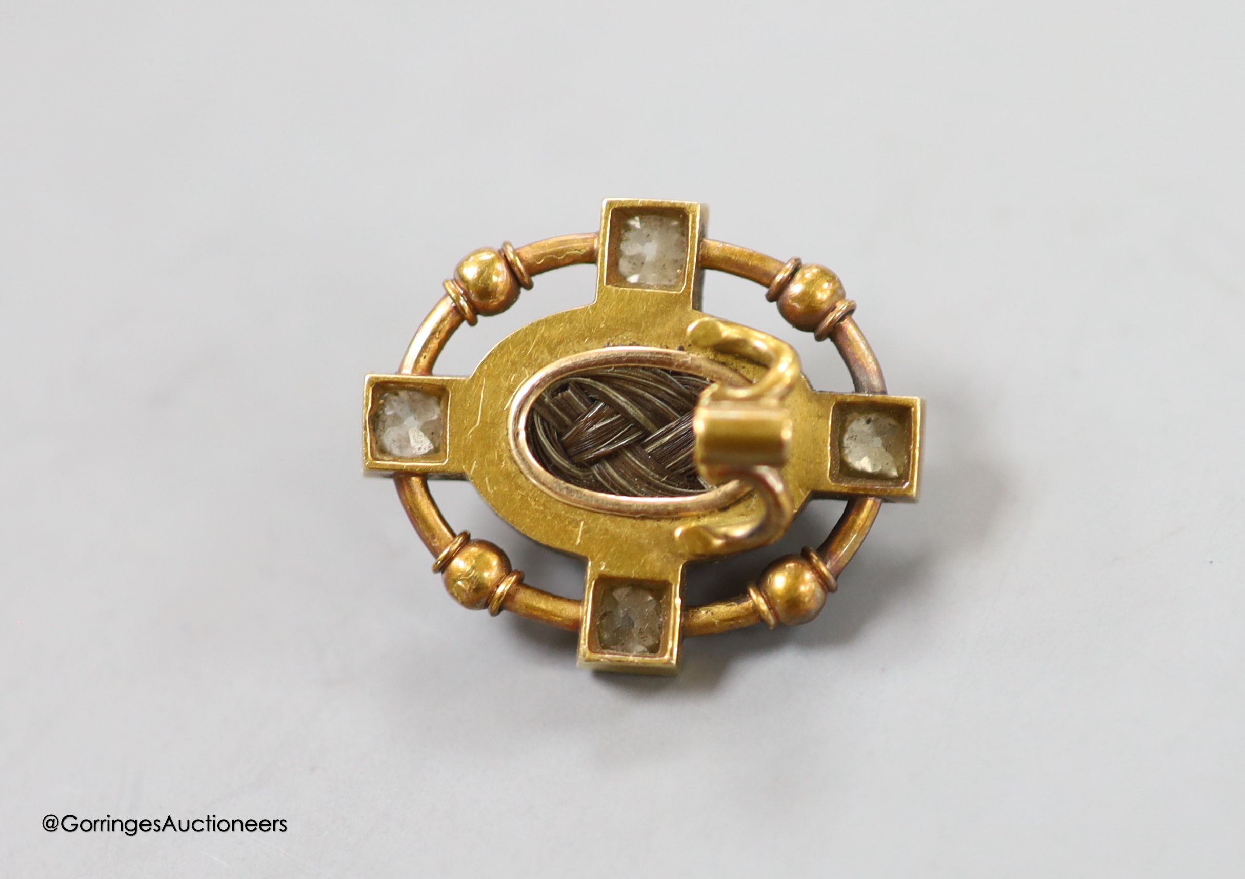 A Victorian yellow metal, banded agate, diamond and black enamel set mourning stick pin head, (no pin), 21mm, gross weight 4.7 grams